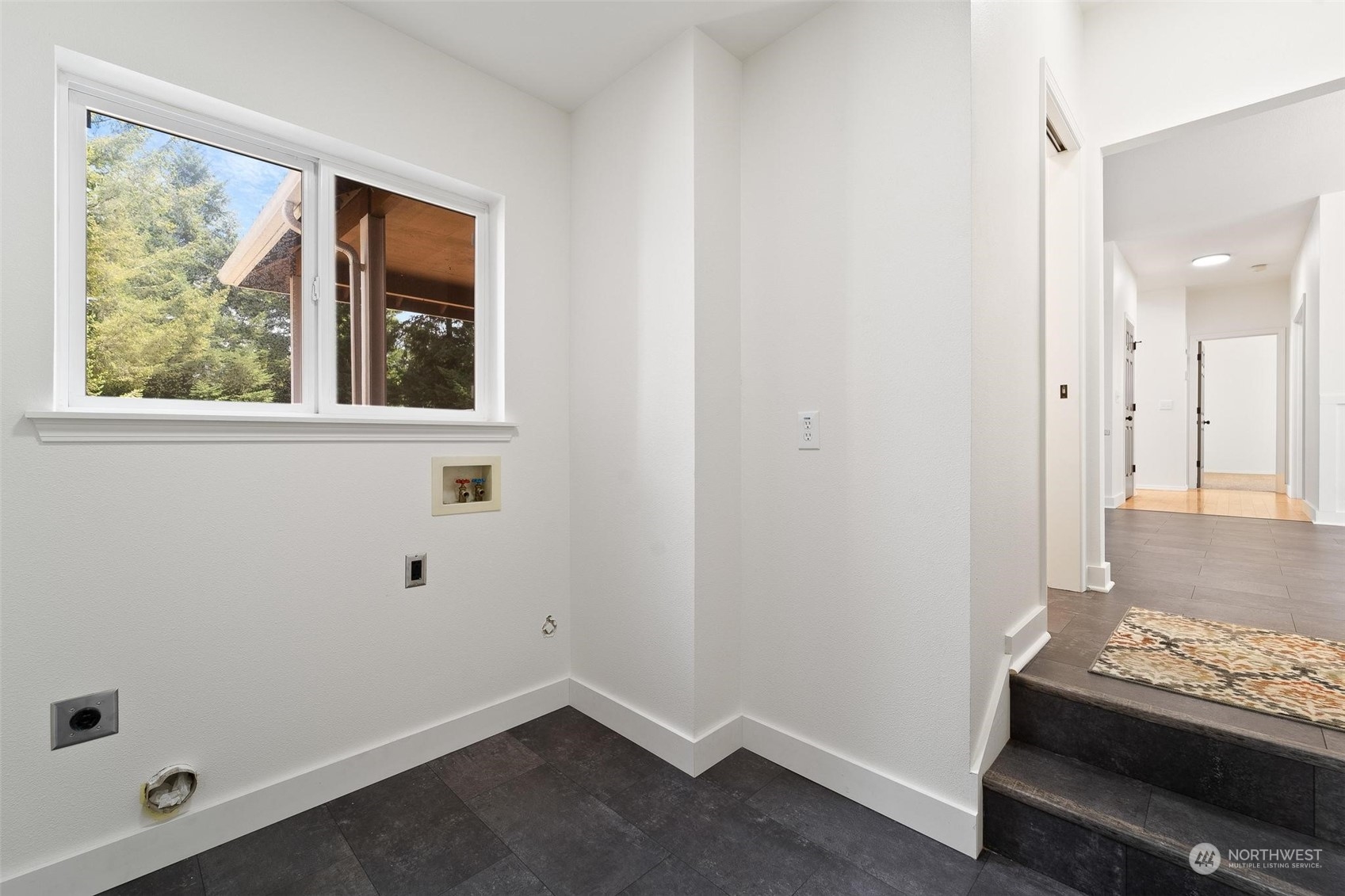 3321 Whiteman Road Southwest Longbranch, WA 98349 - Photo 22 of 40 an empty room with a window