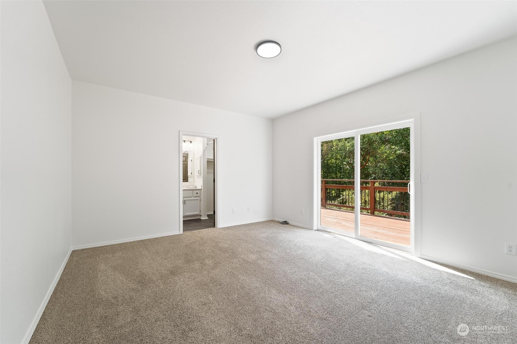 3321 Whiteman Road Southwest Longbranch, WA 98349 - Photo 24 of 40 a view of an empty room with glass door