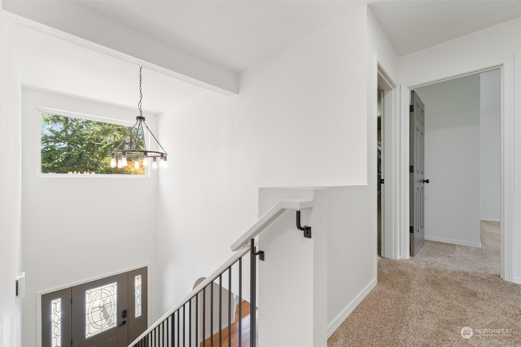 3321 Whiteman Road Southwest Longbranch, WA 98349 - Photo 27 of 40 a view of a hallway with windows and entryway