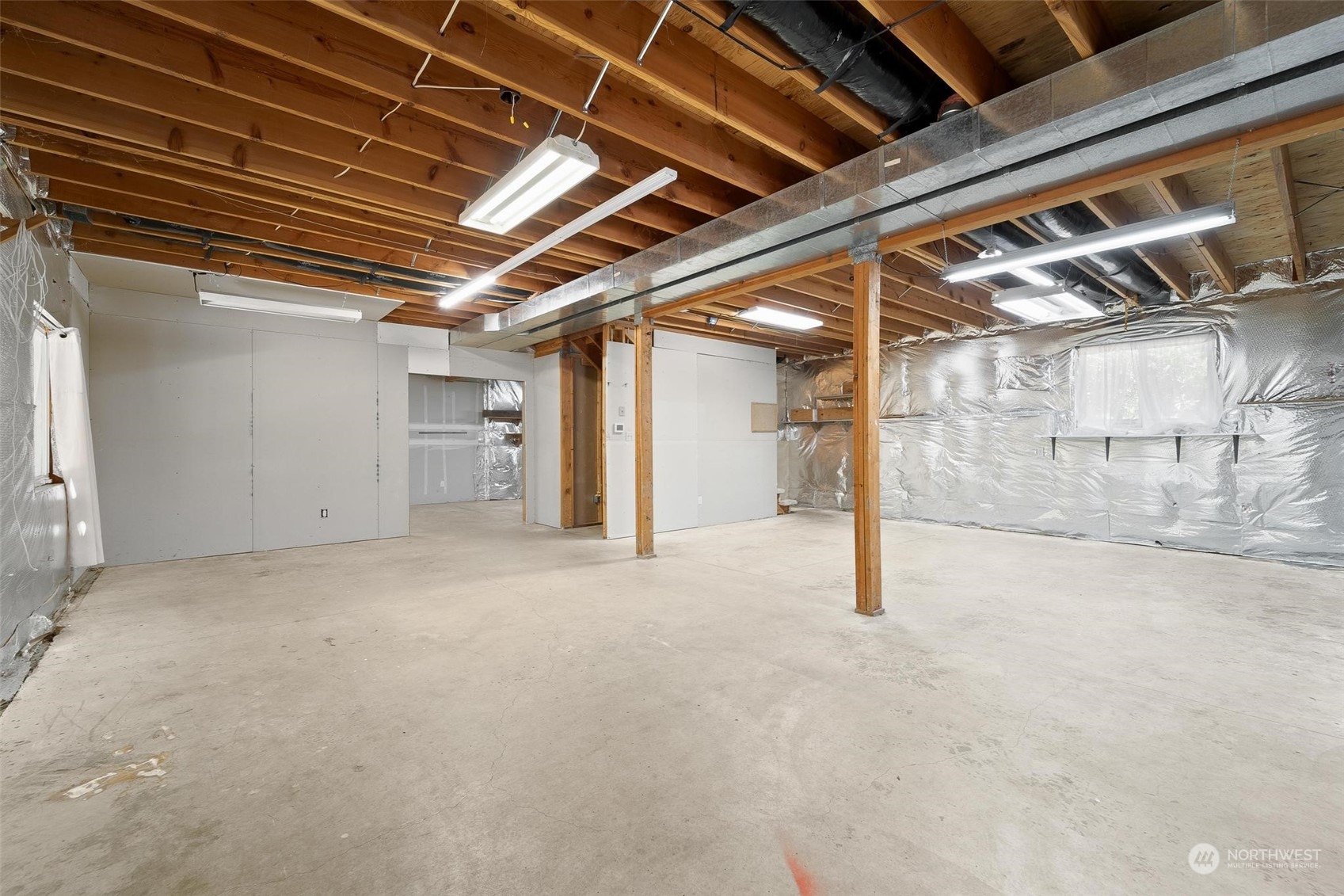 3321 Whiteman Road Southwest Longbranch, WA 98349 - Photo 35 of 40 a view of empty room with wooden floor