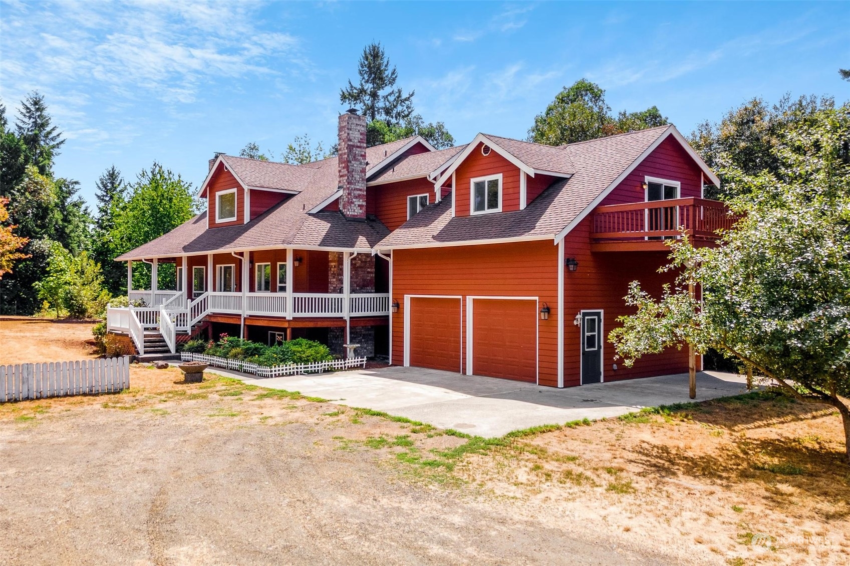 3321 Whiteman Road Southwest Longbranch, WA 98349 - Photo 40 of 40 a view of a house with a yard and sitting area