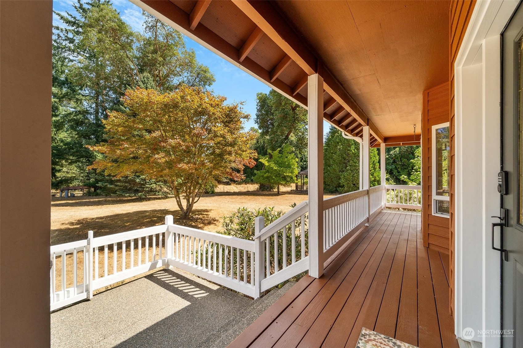 3321 Whiteman Road Southwest Longbranch, WA 98349 - Photo 8 of 40 a view of balcony with wooden floor