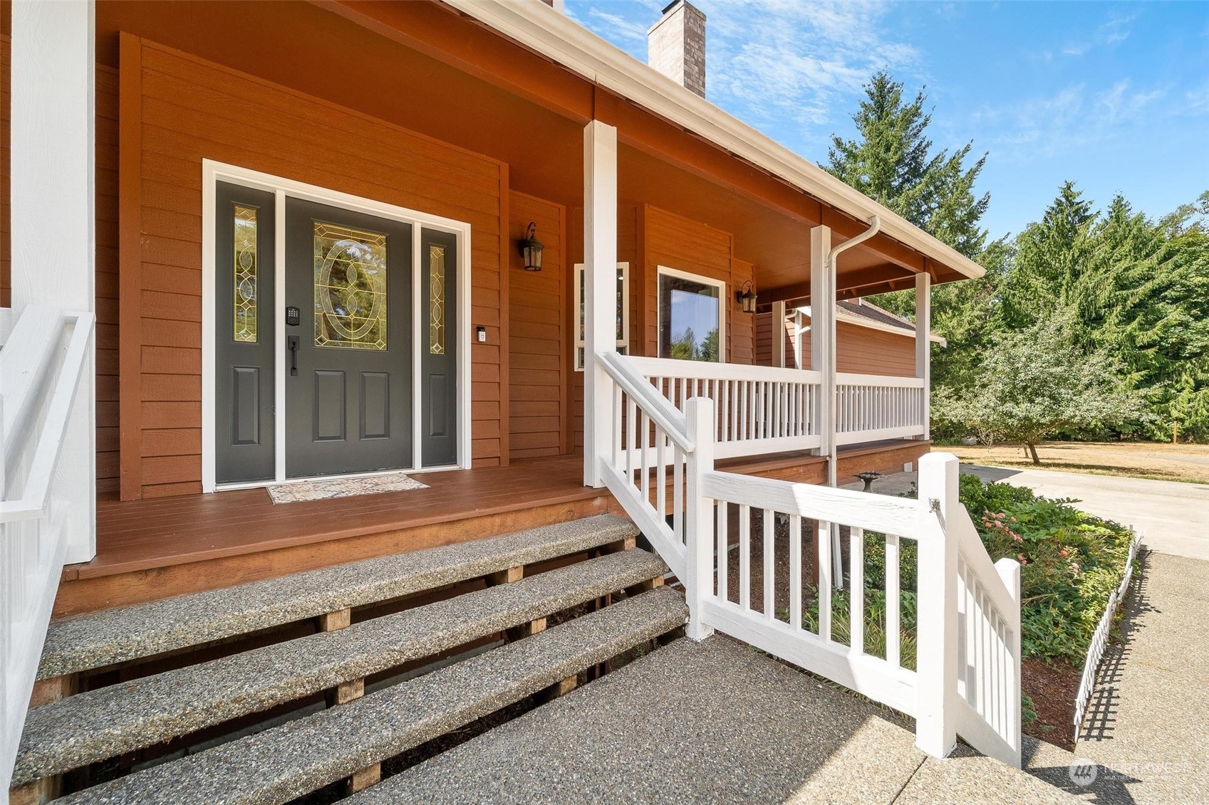 3321 Whiteman Road Southwest Longbranch, WA 98349 - Photo 10 of 40 a view of a house with backyard and porch