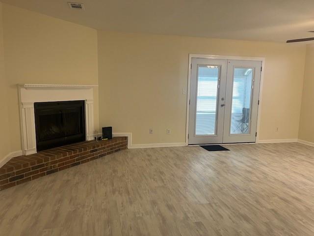 5950 WinterGreen Road Northwest Norcross, GA 30093 - Photo 18 of 33 an empty room with windows and fireplace