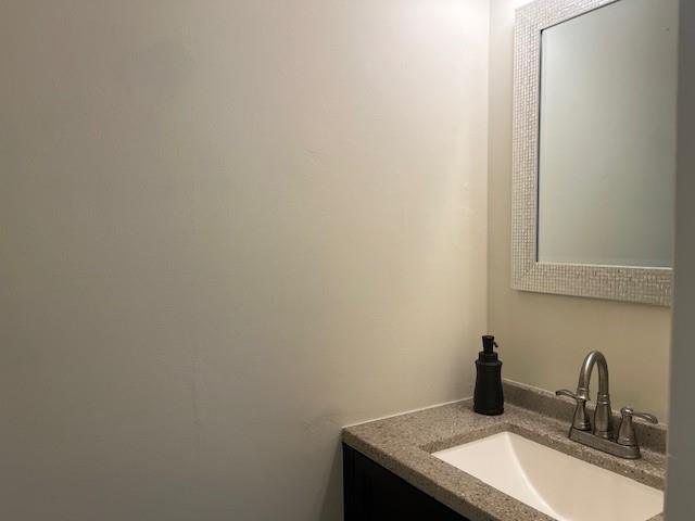 5950 WinterGreen Road Northwest Norcross, GA 30093 - Photo 19 of 33 a bathroom with a sink and vanity