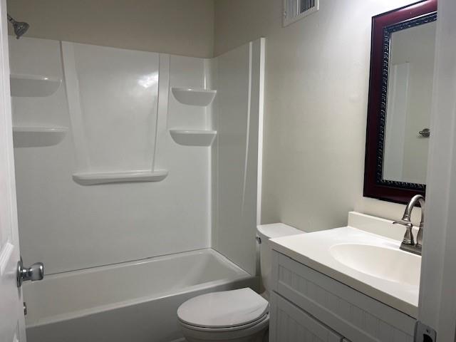 5950 WinterGreen Road Northwest Norcross, GA 30093 - Photo 26 of 33 a bathroom with a sink a toilet and shower