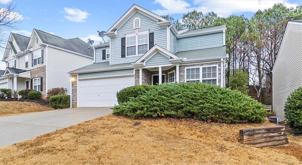 329 Meadows Lane Canton, GA 30114 - Photo 3 of 36 front view of a house with a yard