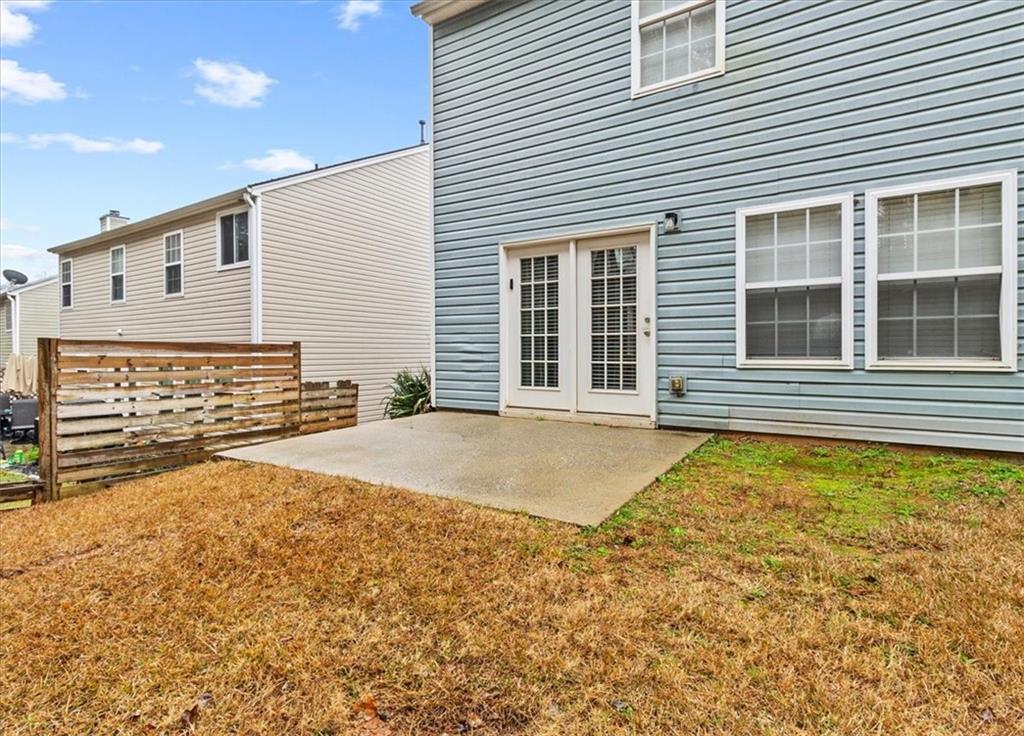 329 Meadows Lane Canton, GA 30114 - Photo 33 of 36 a view of house with backyard and windows