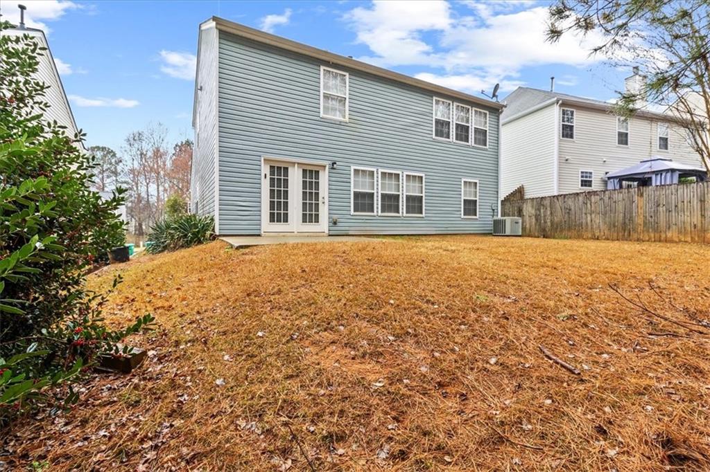 329 Meadows Lane Canton, GA 30114 - Photo 34 of 36 a front view of a house with a yard