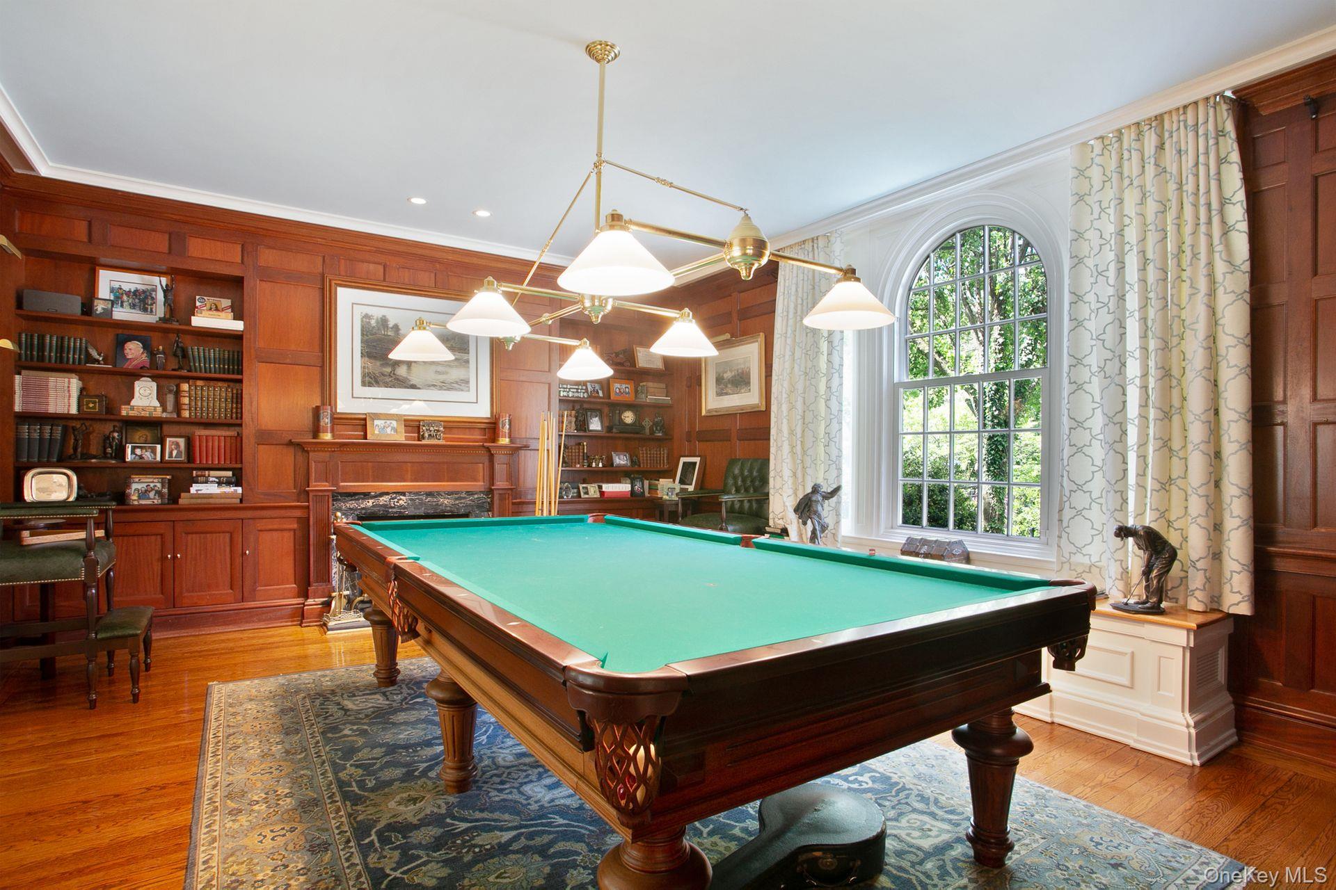 1 Roland Road Irvington, NY 10533 - Photo 12 of 35 a room with pool tables and a window