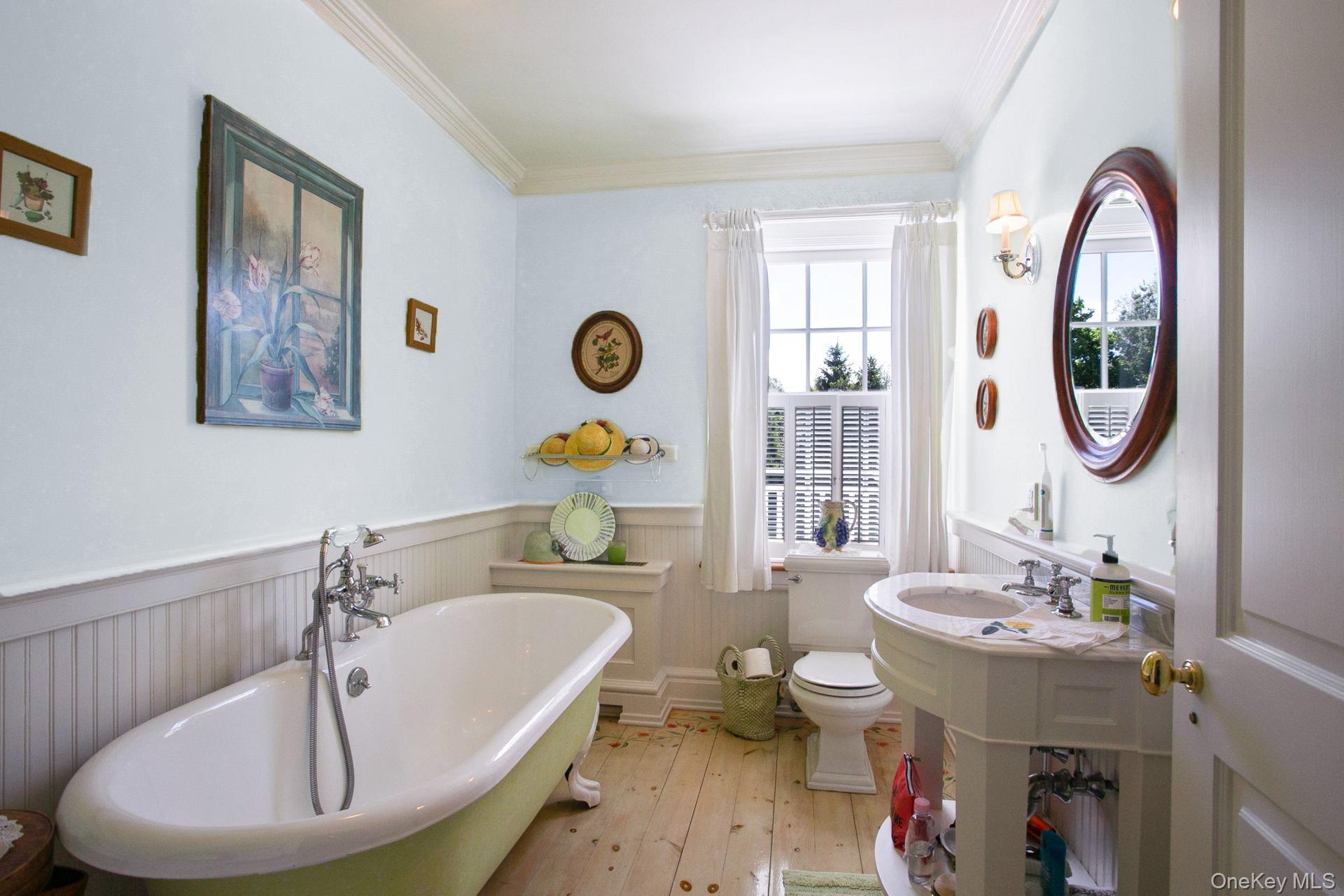 1 Roland Road Irvington, NY 10533 - Photo 20 of 35 a bathroom with a sink and a mirror