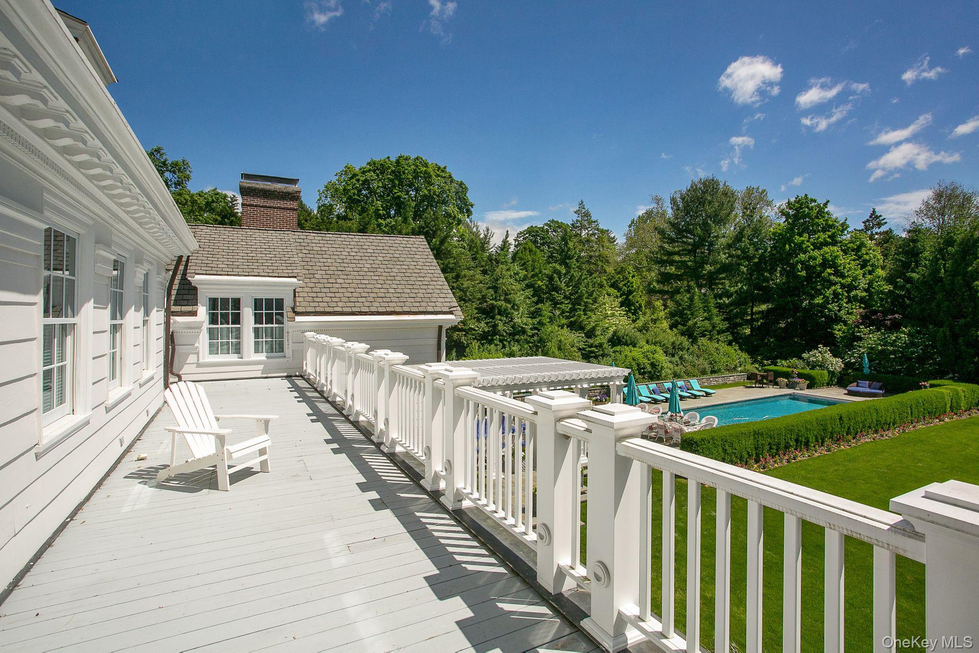 1 Roland Road Irvington, NY 10533 - Photo 26 of 49 a view of a house with wooden fence
