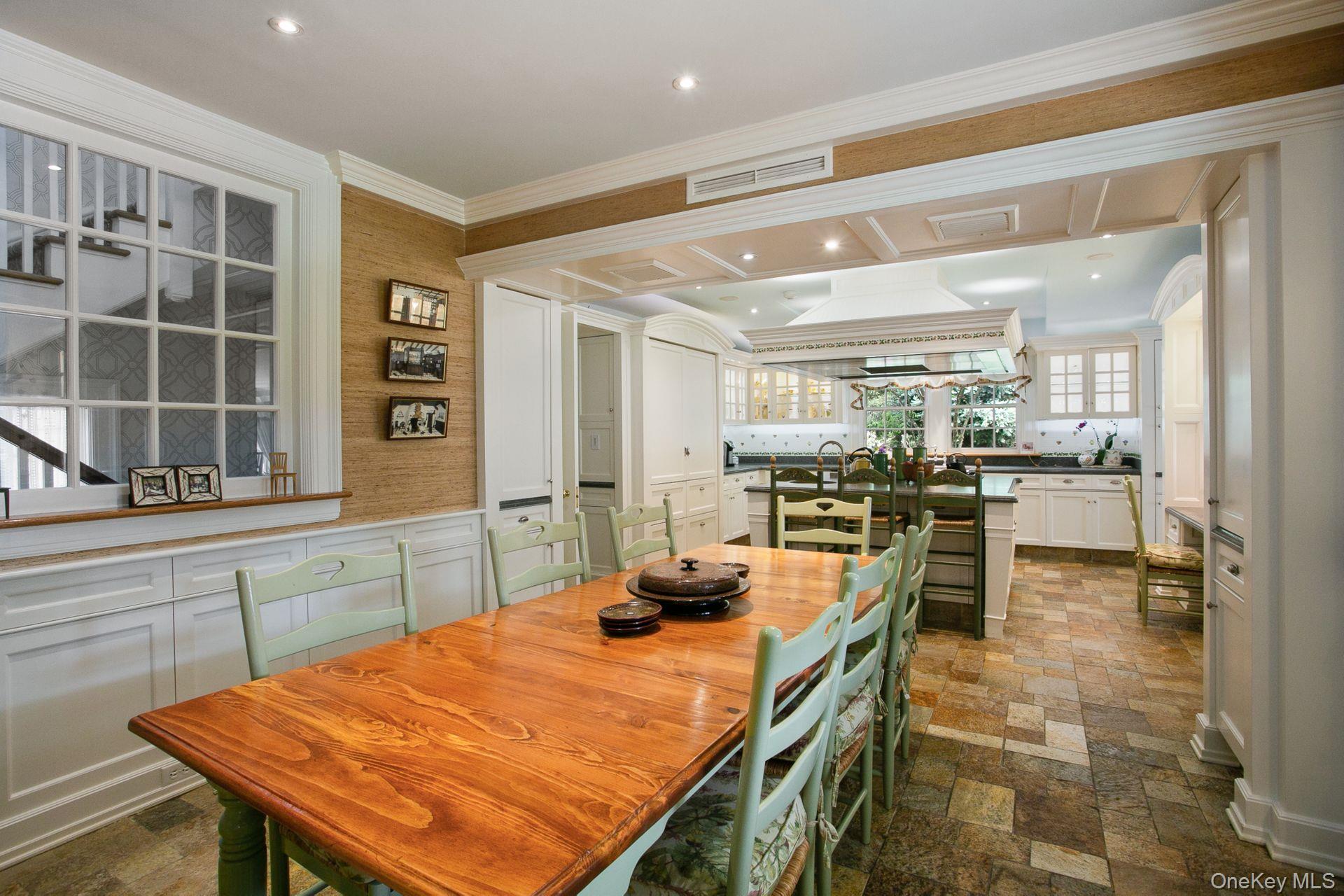 1 Roland Road Irvington, NY 10533 - Photo 7 of 35 a dining table with chairs and window