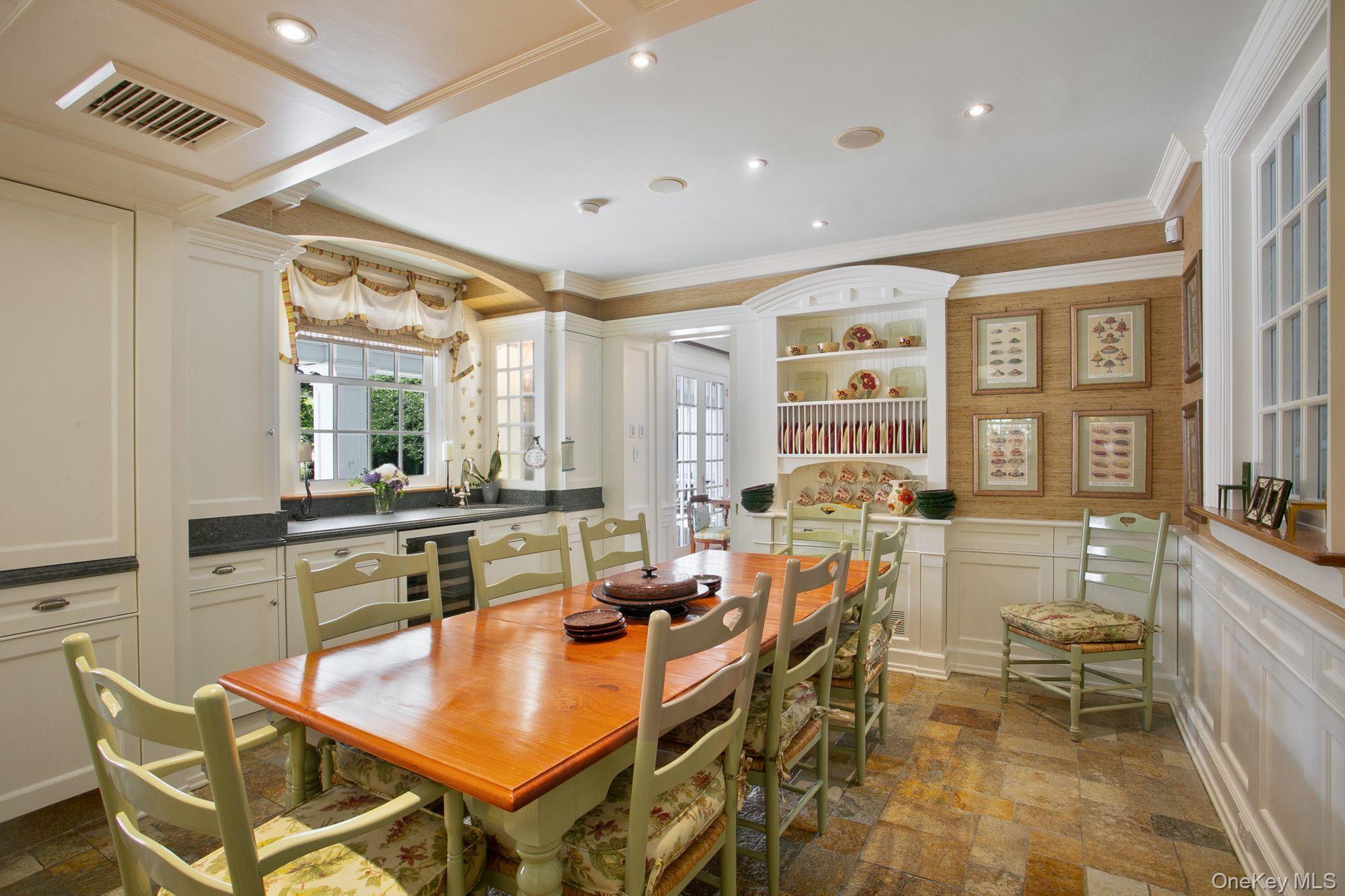 1 Roland Road Irvington, NY 10533 - Photo 8 of 35 a room with chairs a table and chairs in it