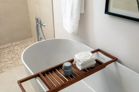 a bedroom with bed and a couch