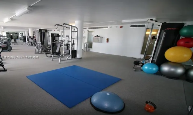 a view of a house with outdoor space and sitting area