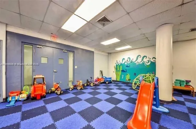 an aerial view of a house with a swimming pool outdoor seating and yard
