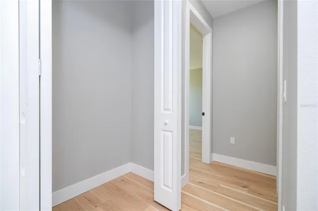 a bathroom with a double vanity sink a mirror and shower