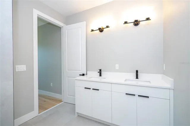 an aerial view of house with yard swimming pool and outdoor seating