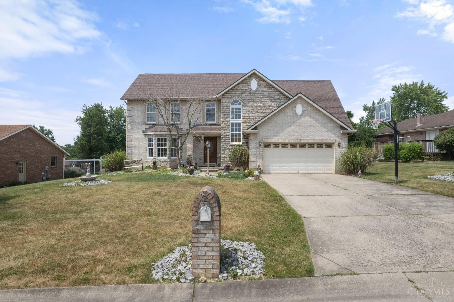 6361 Sharps Ridge Court Hamilton, OH 45011 - Photo 1 of 32 Beautiful transitional 2 story home. Quoined brick and stone on all sides, this custom-built home has over 3300 total square feet of living space.