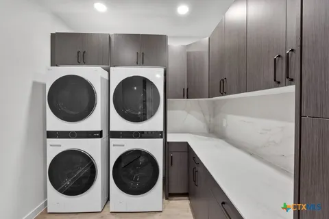 a view of a washer and dryer in a utility room