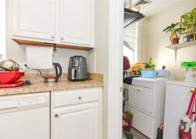 a bedroom with a bed and a television