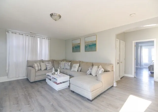 a bedroom with a bed and a tv