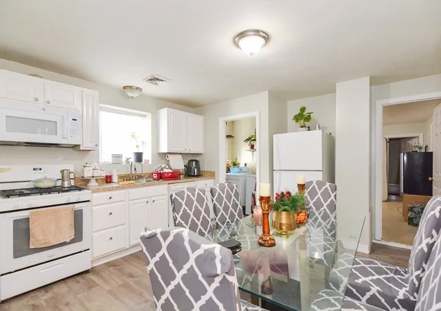 a outdoor space with furniture and wooden floor