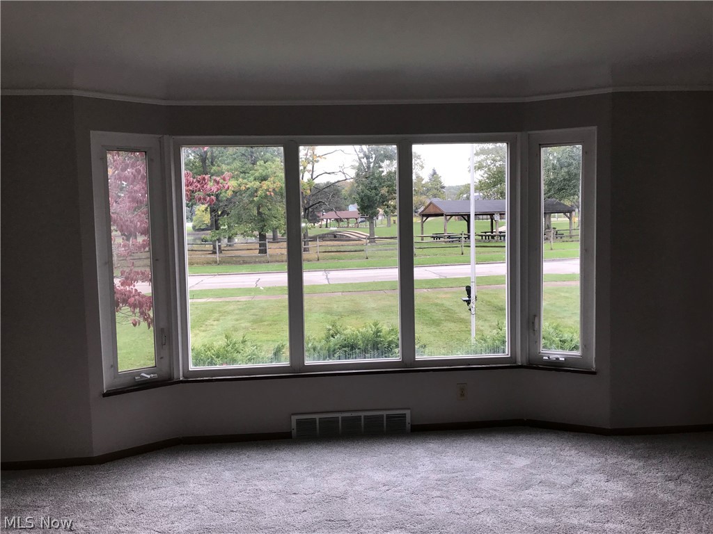 6564 Ridgewood Lakes Drive Parma, OH 44129 - Photo 6 of 33 Home is directly across from Ridgewood Lake. Large windows allow for lots of natural light. New carpeting throughout, October 2021