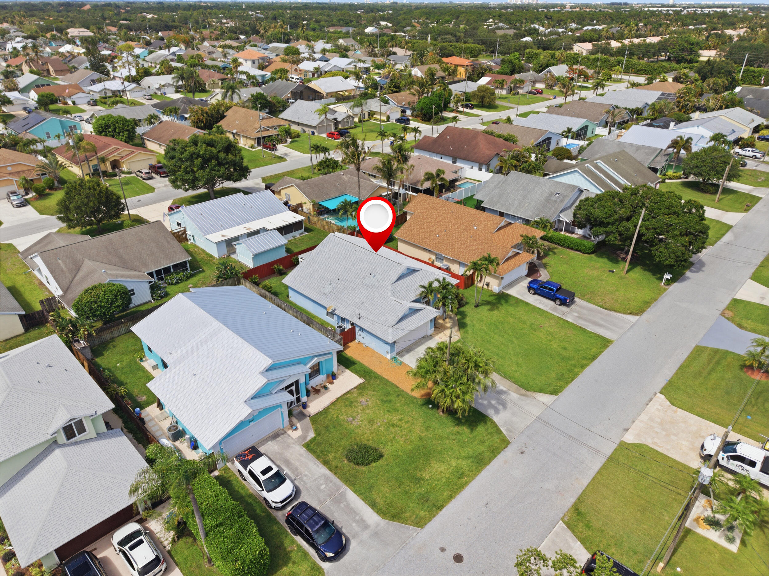 6141 Michael Street Jupiter, FL 33458 - Photo 3 of 19 31_dji_20260610153509_0243_d_pin