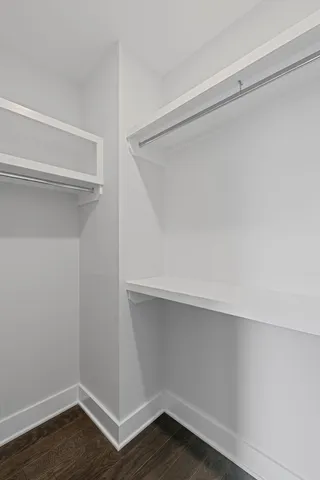 a view of an empty walk in closet