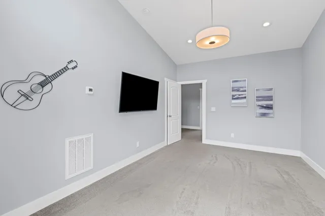 a view of a livingroom with a flat screen tv