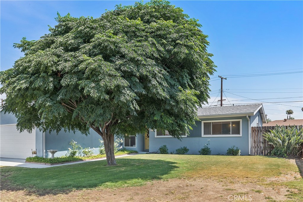 4175 Rucker Lane Riverside, CA 92504 - Photo 1 of 1 a front view of a house with garden