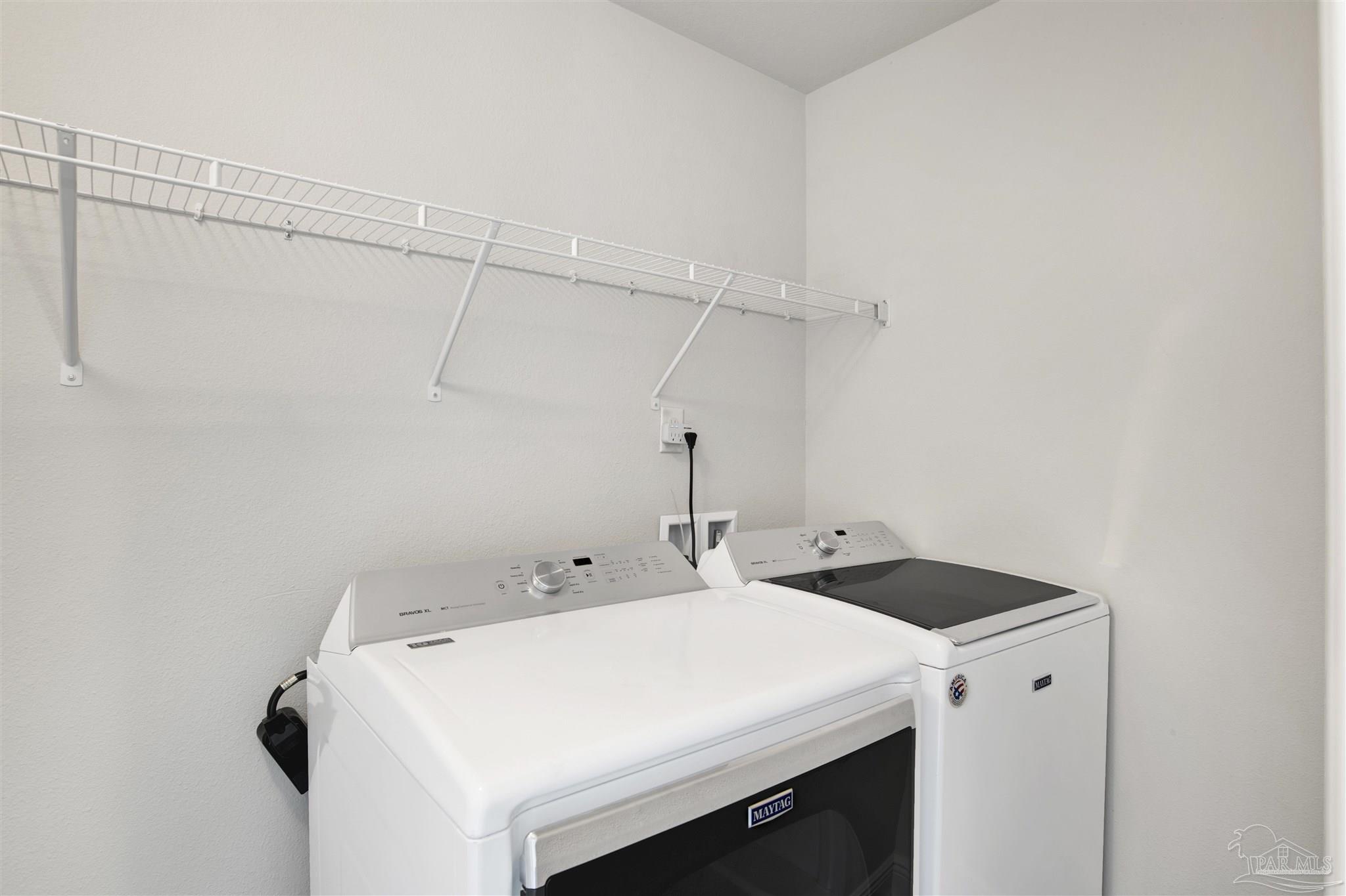 12295 Pinfish Road Pensacola, FL 32506 - Photo 23 of 34 a utility room with dryer and washer