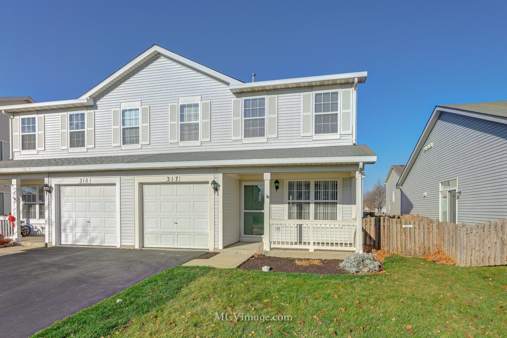 317 Reston Circle Romeoville, IL 60446 - Photo 1 of 15 front view of a house with a yard
