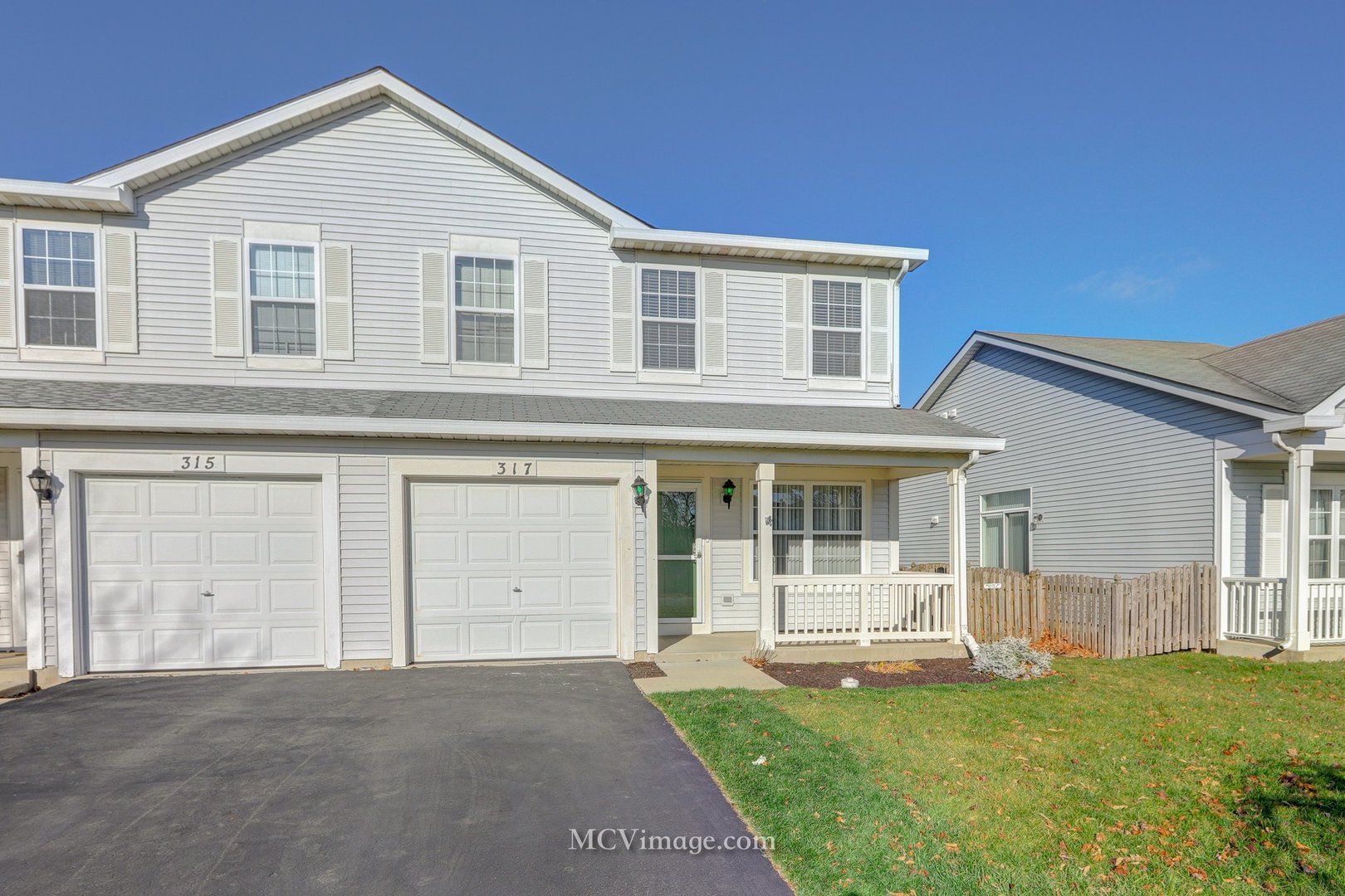 317 Reston Circle Romeoville, IL 60446 - Photo 2 of 15 a view of a house with backyard and a garden