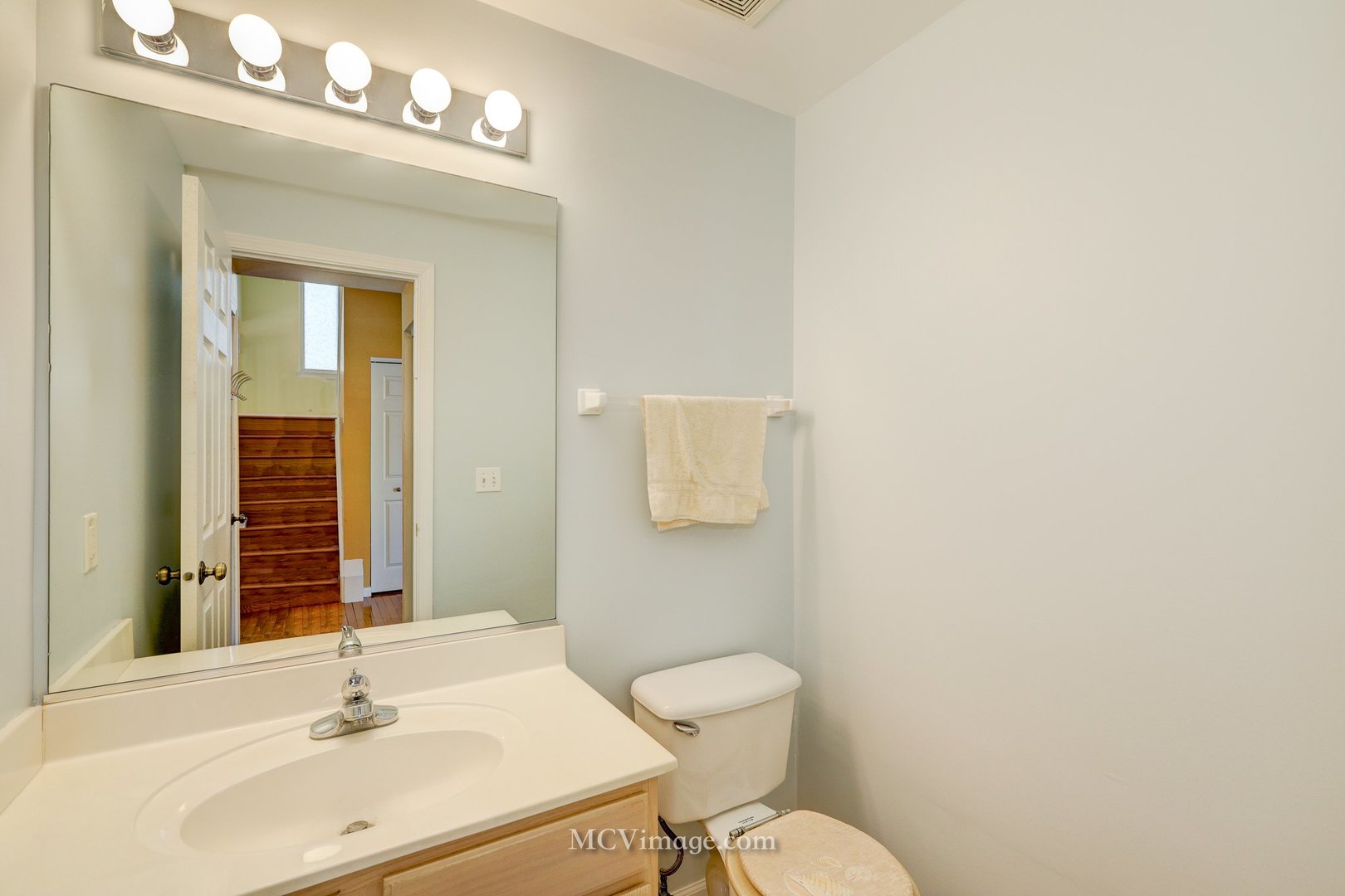 317 Reston Circle Romeoville, IL 60446 - Photo 14 of 15 a bathroom with a sink a toilet and mirror