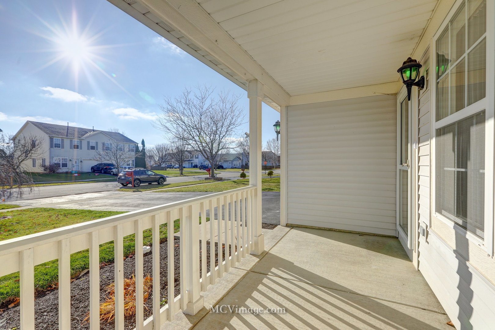 317 Reston Circle Romeoville, IL 60446 - Photo 4 of 15 a view of a house with a wooden fence
