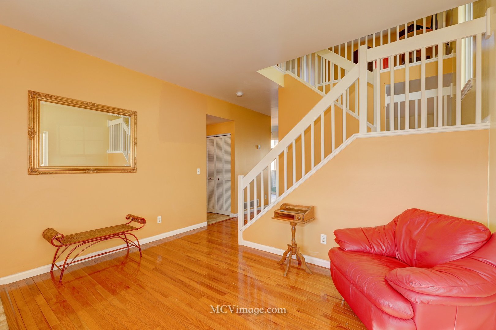 317 Reston Circle Romeoville, IL 60446 - Photo 6 of 15 a view of a livingroom with furniture and stairs