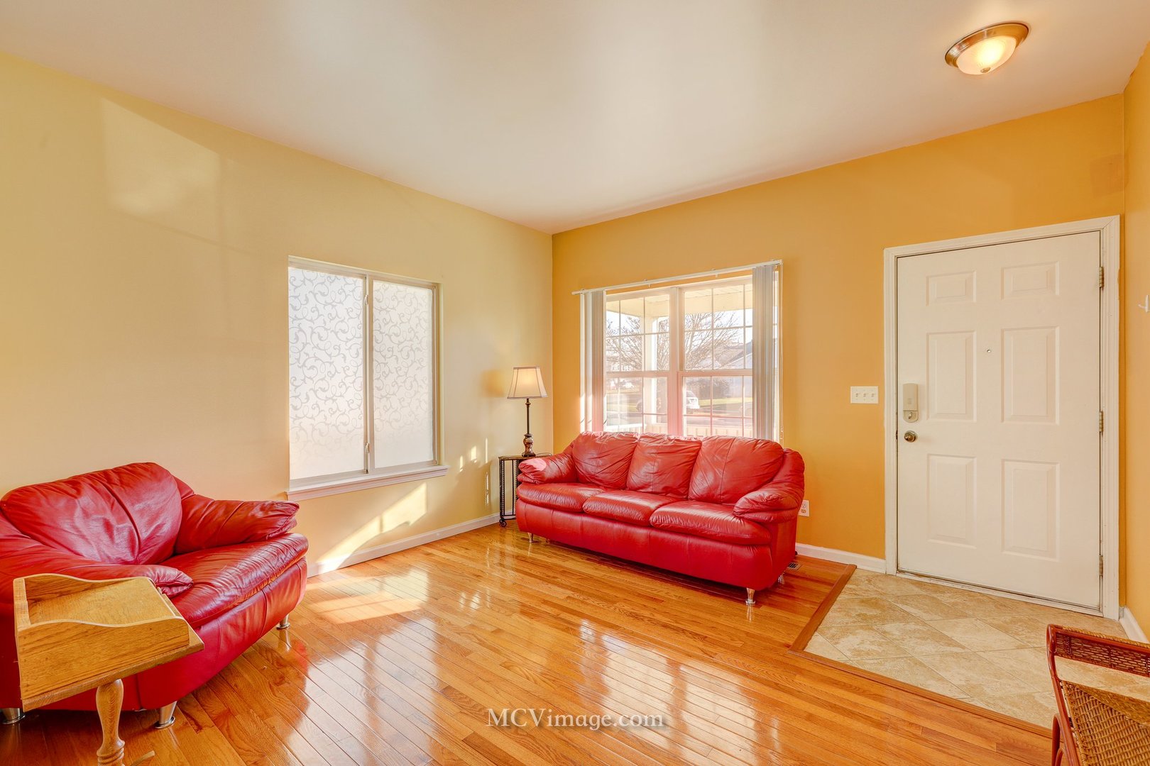 317 Reston Circle Romeoville, IL 60446 - Photo 7 of 15 a living room with furniture and a couch