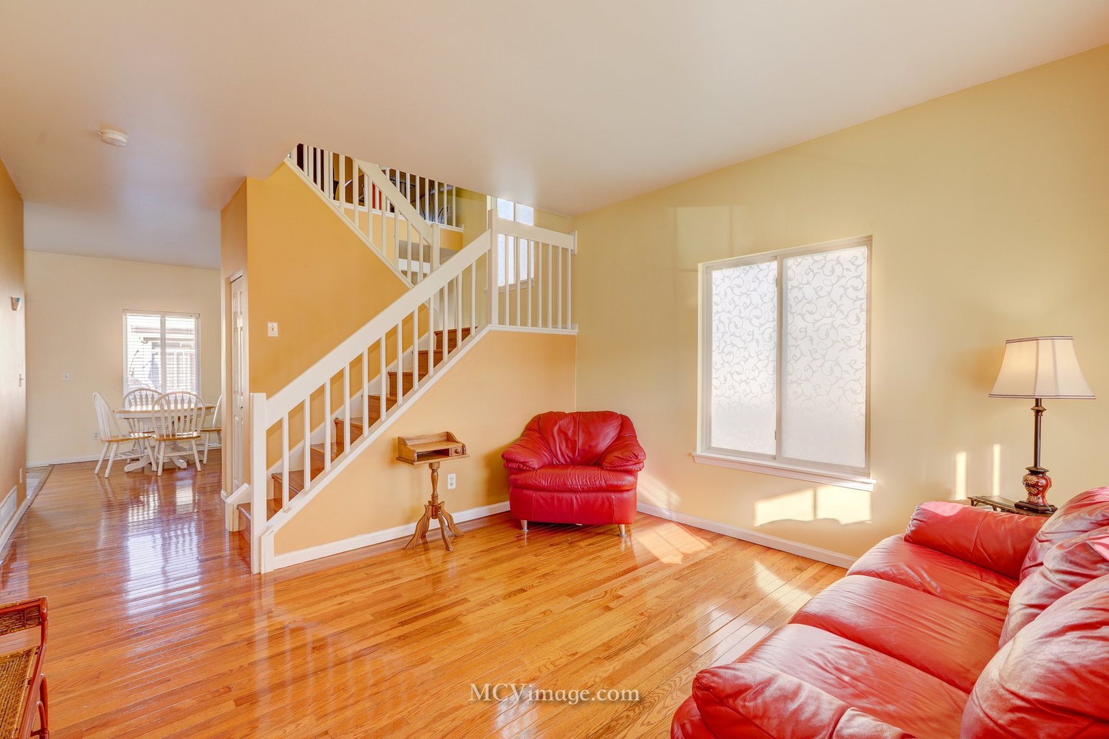 317 Reston Circle Romeoville, IL 60446 - Photo 8 of 15 a living room with furniture and wooden floor