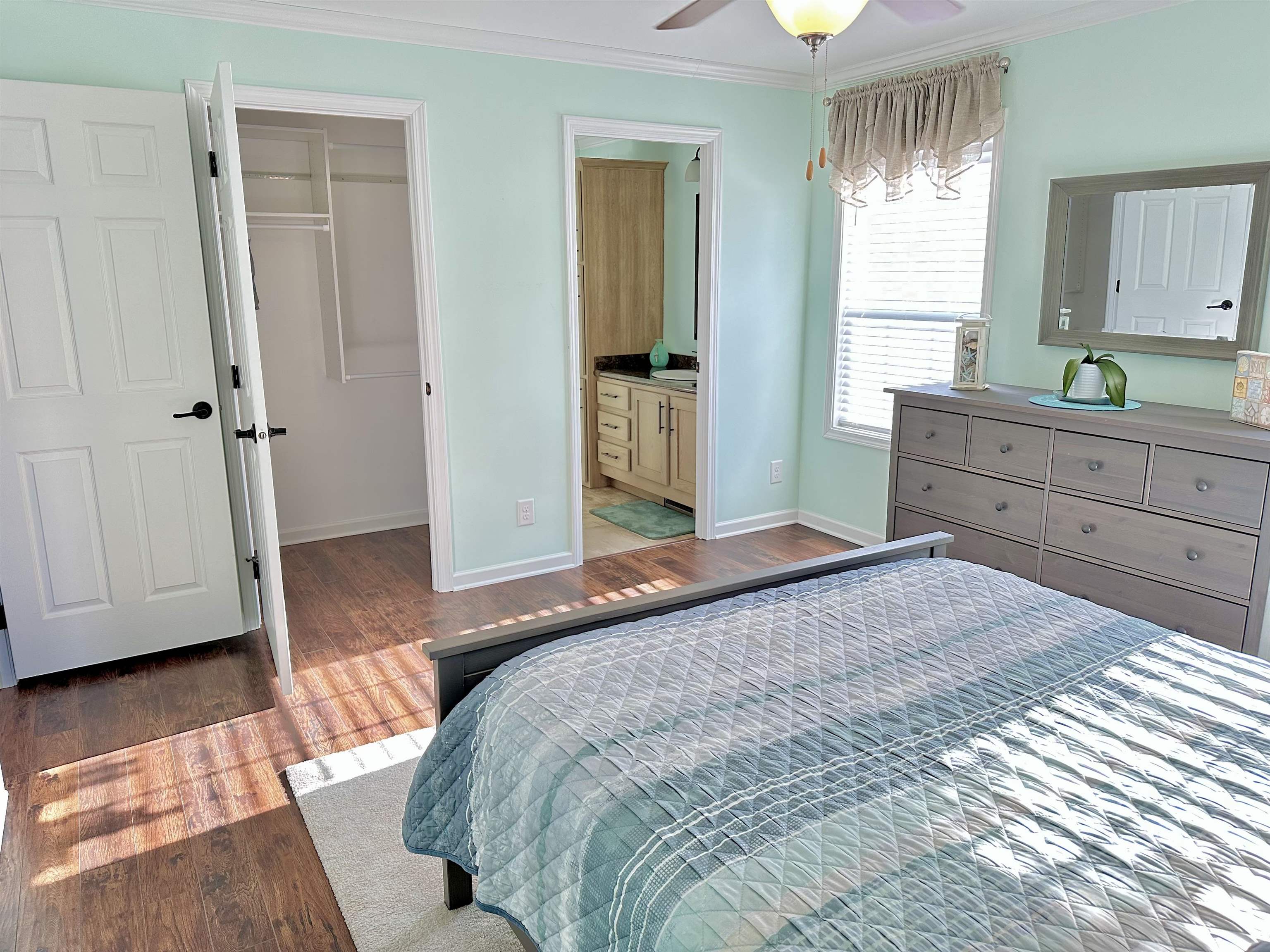 2058 Shore Road Seaville, NJ 08230 - Photo 24 of 36 a bedroom with a bed and a dresser