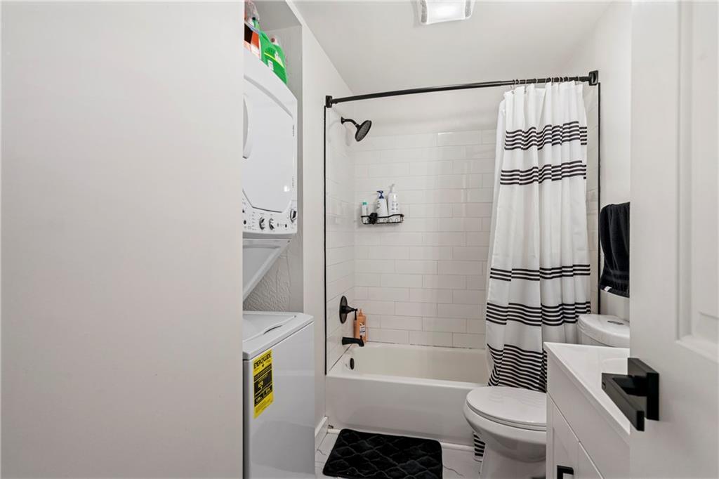 5140 Butler Street Pittsburgh, PA 15201 - Photo 20 of 25 a bathroom with a toilet and a shower