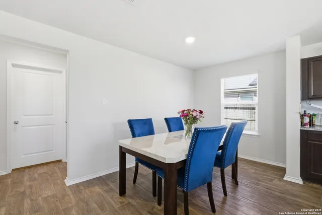 a view of a dining room with furniture