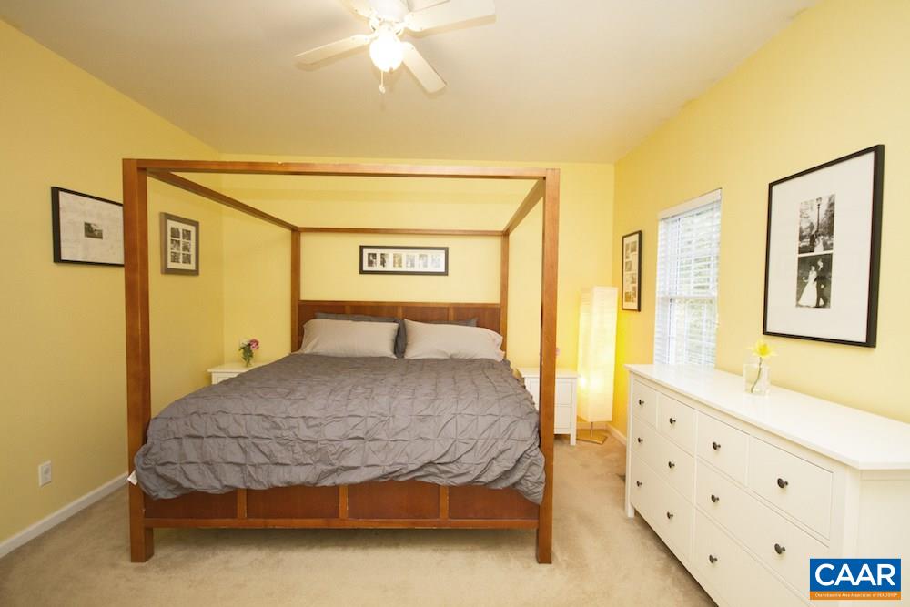 81 Hords Hill Road Ruckersville, VA 22968 - Photo 12 of 34 a spacious bedroom with a bed and a cabinets