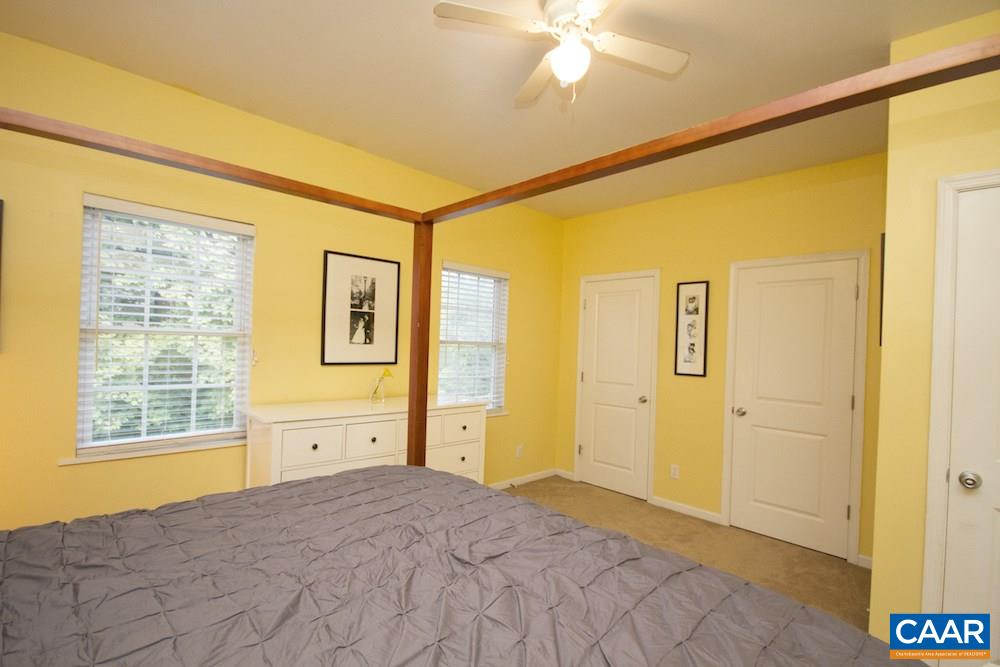 81 Hords Hill Road Ruckersville, VA 22968 - Photo 14 of 34 a bedroom with a bed and a window