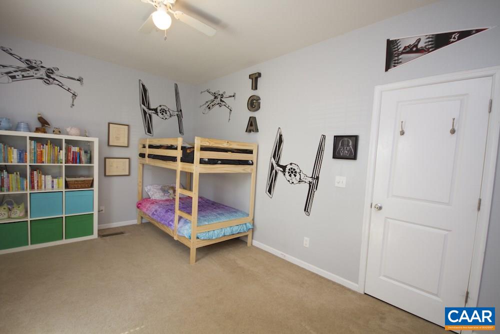 81 Hords Hill Road Ruckersville, VA 22968 - Photo 18 of 34 a bedroom with a bed and a window