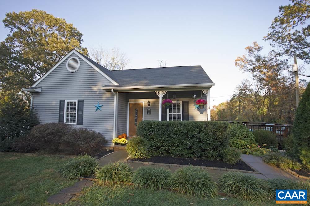 81 Hords Hill Road Ruckersville, VA 22968 - Photo 2 of 34 a front view of a house with garden