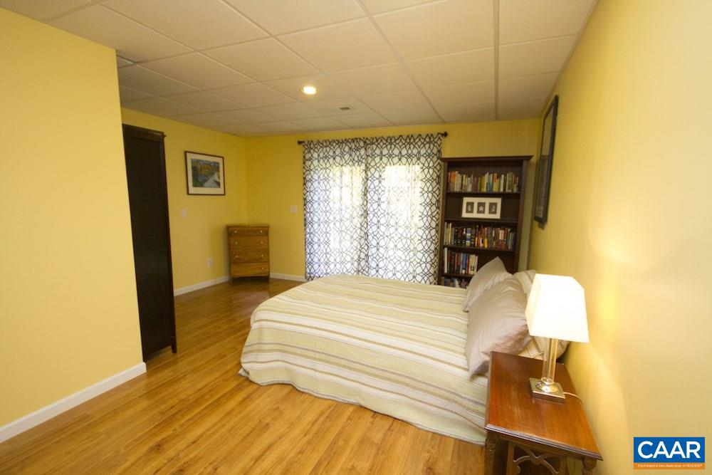 81 Hords Hill Road Ruckersville, VA 22968 - Photo 24 of 34 a bedroom with a bed and a window