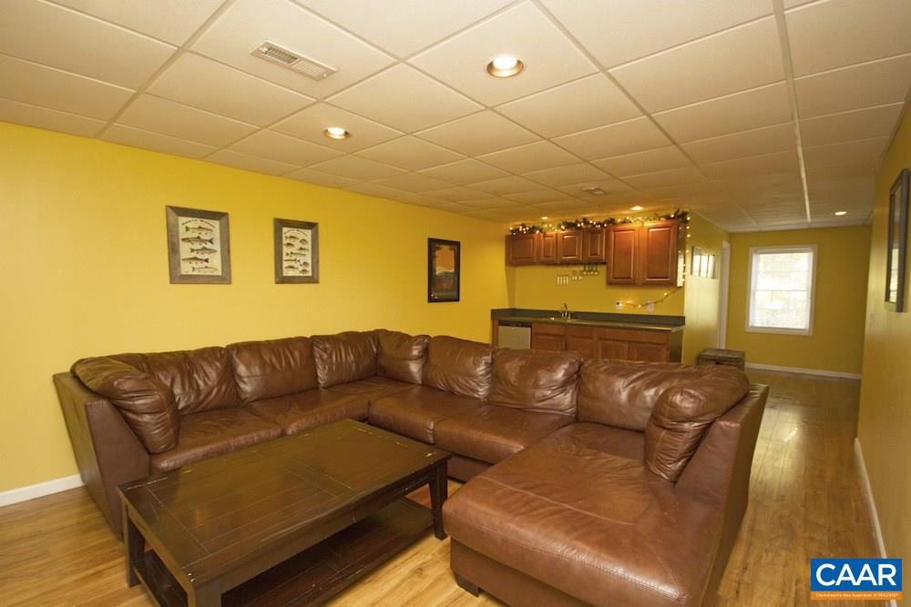 81 Hords Hill Road Ruckersville, VA 22968 - Photo 25 of 34 a living room with furniture and a couch